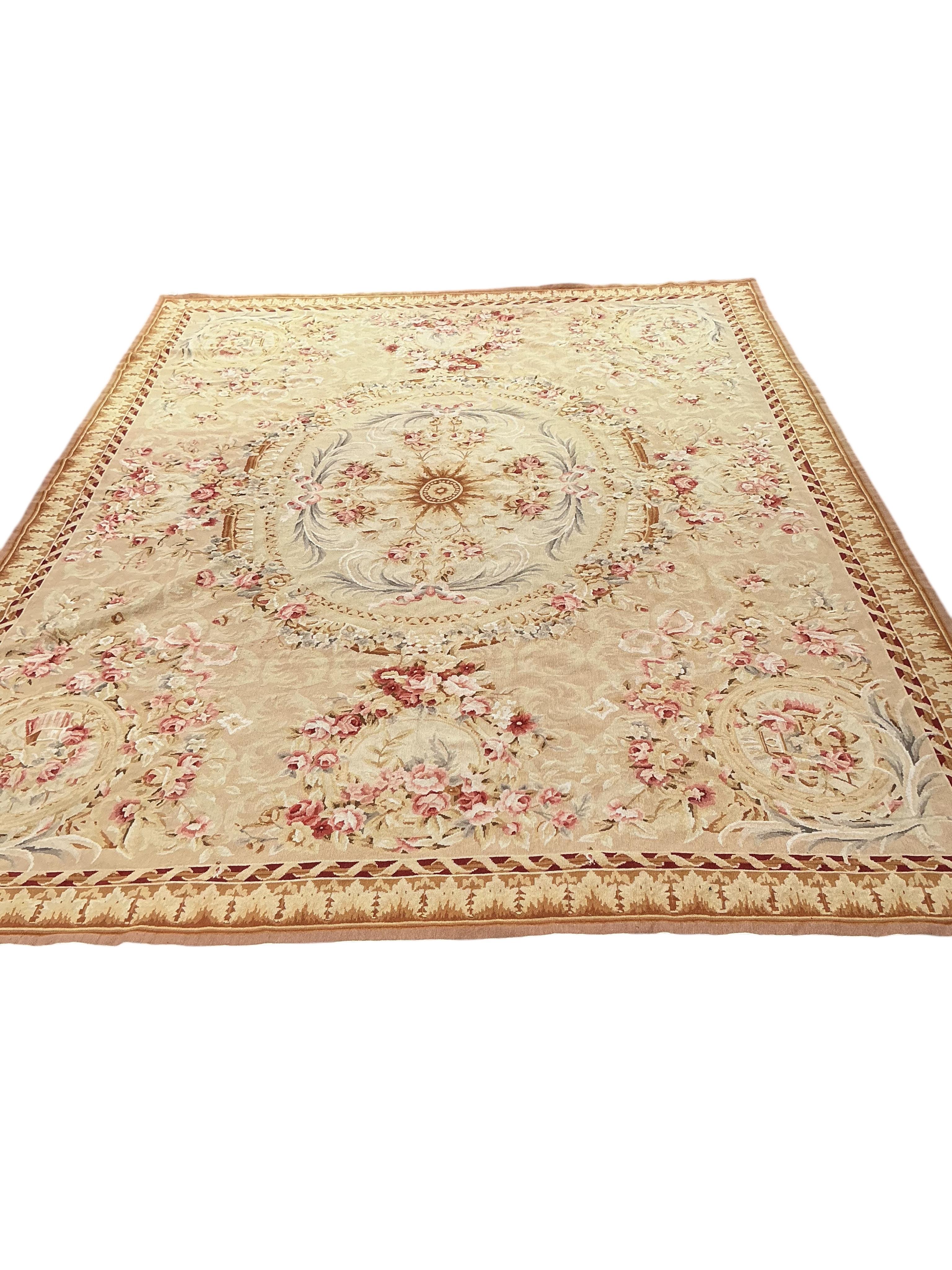 An Aubusson style carpet, 345 x 260cm